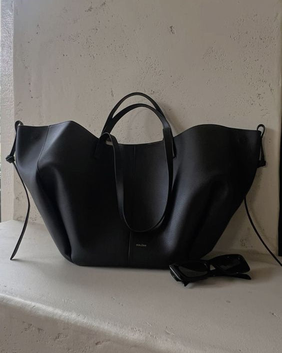 Brown oversized vintage Lumina Wear Isabella handbag with versatile straps, showing its spacious design and adjustable features.