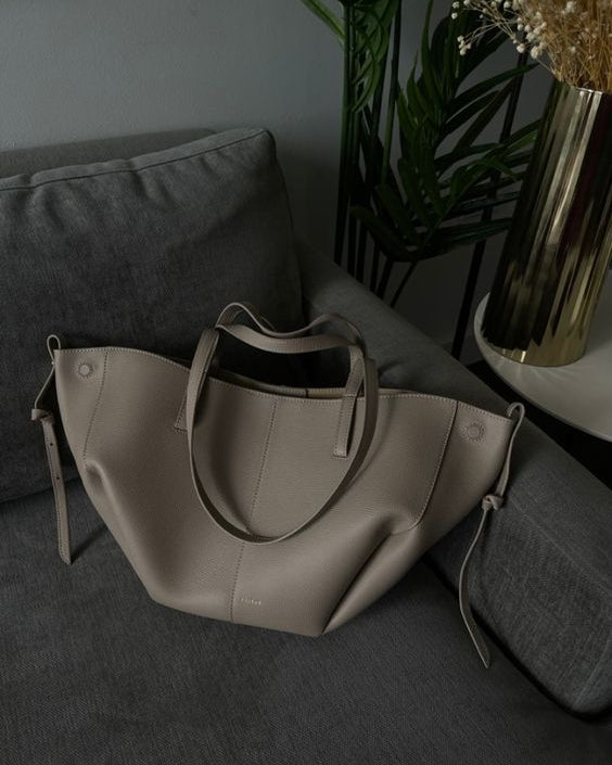 Brown oversized vintage Lumina Wear Isabella handbag with versatile straps, featuring textured leather and spacious interior.