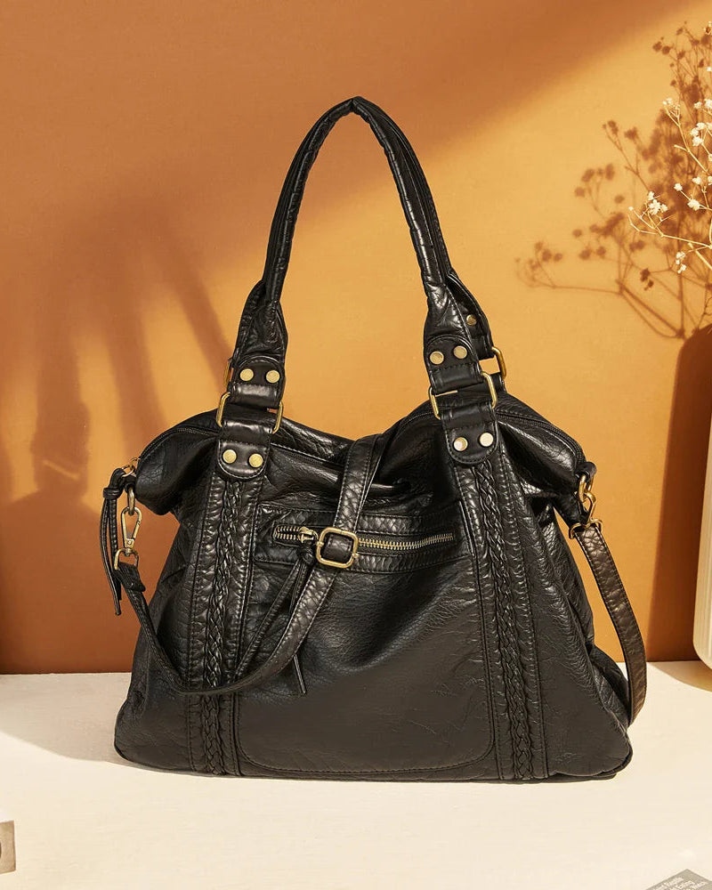 Black Isabella retro-chic unisex school backpack by Lumina Wear with spacious main compartment and stylish design.