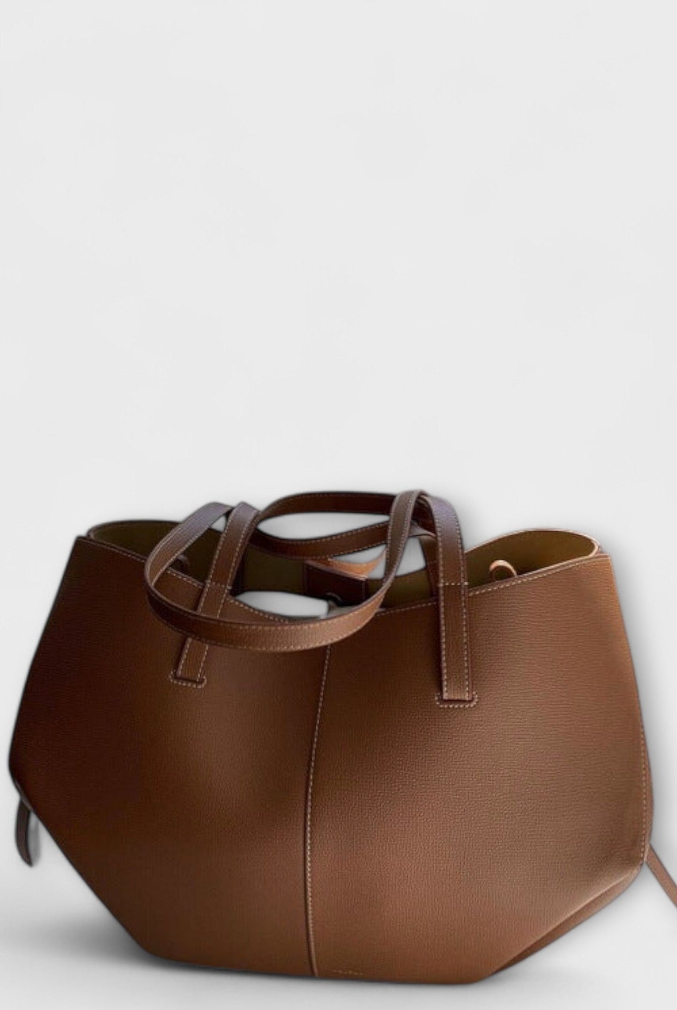 Lumina Wear Isabella sculpted minimalist tote bag in brown with spacious design, measuring 32cm by 13cm by 22cm.