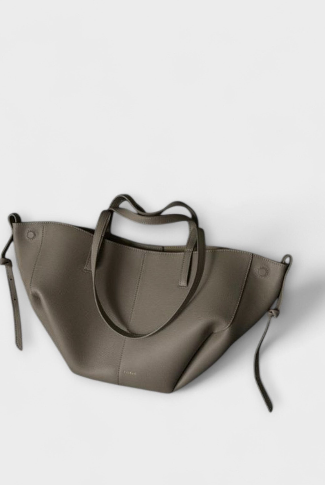 Lumina Wear Isabella minimalist tote bag in brown with sculpted design and spacious interior, measuring 32cm x 13cm x 22cm.