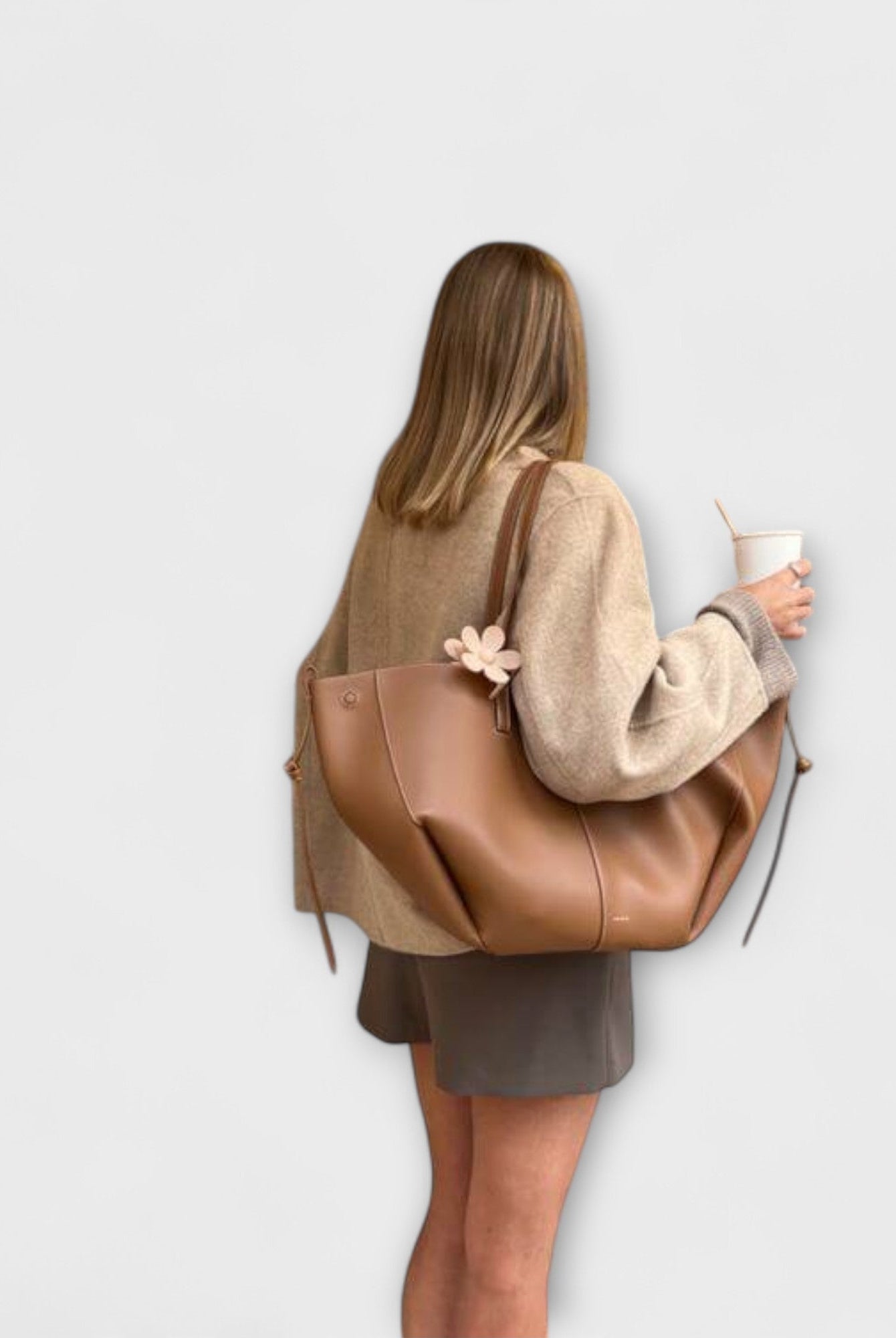 Brown Isabella sculpted minimalist tote bag by Lumina Wear, spacious design with 32cm x 13cm x 22cm dimensions, perfect for everyday use.