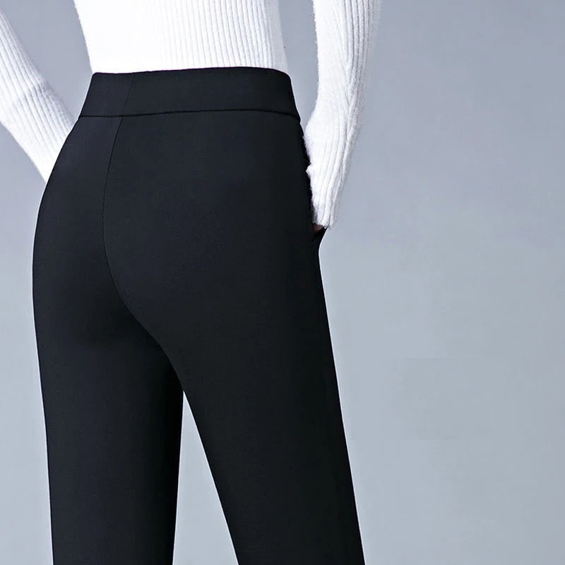 Black high waist leggings with faux pockets from Lumina Wear, featuring a sleek design and comfortable fit.