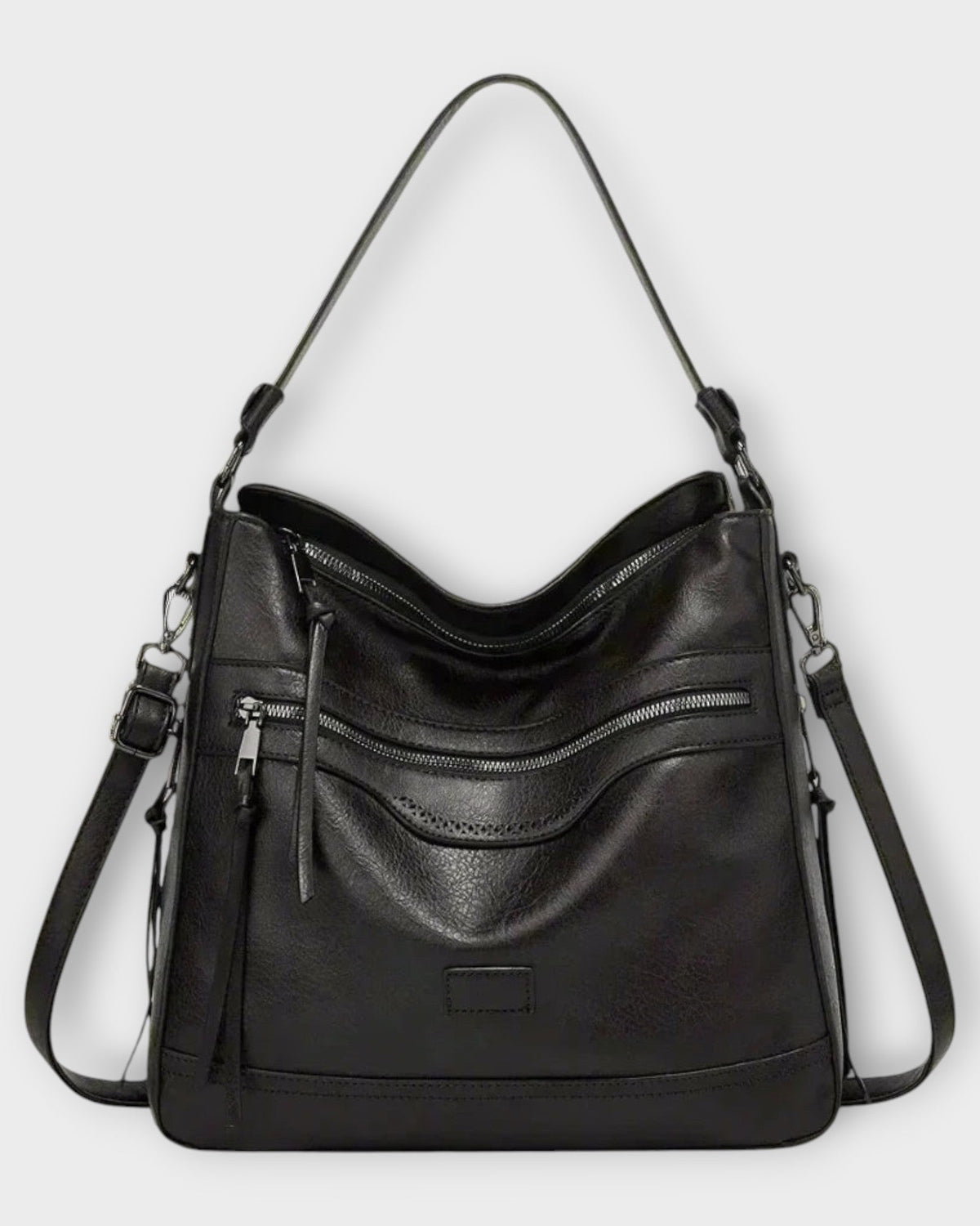 Isabella black slouchy shoulder handbag with versatile straps by Lumina Wear, featuring a soft, slouchy design and adjustable strap details.