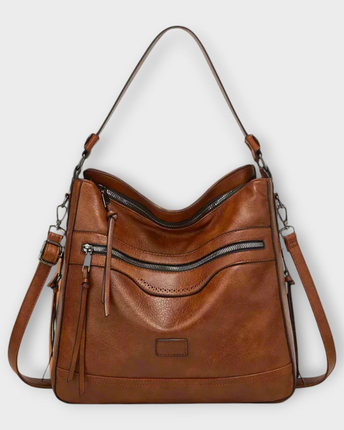 Lumina Wear Isabella slouchy black shoulder bag with versatile straps, featuring a spacious design and stylish look.