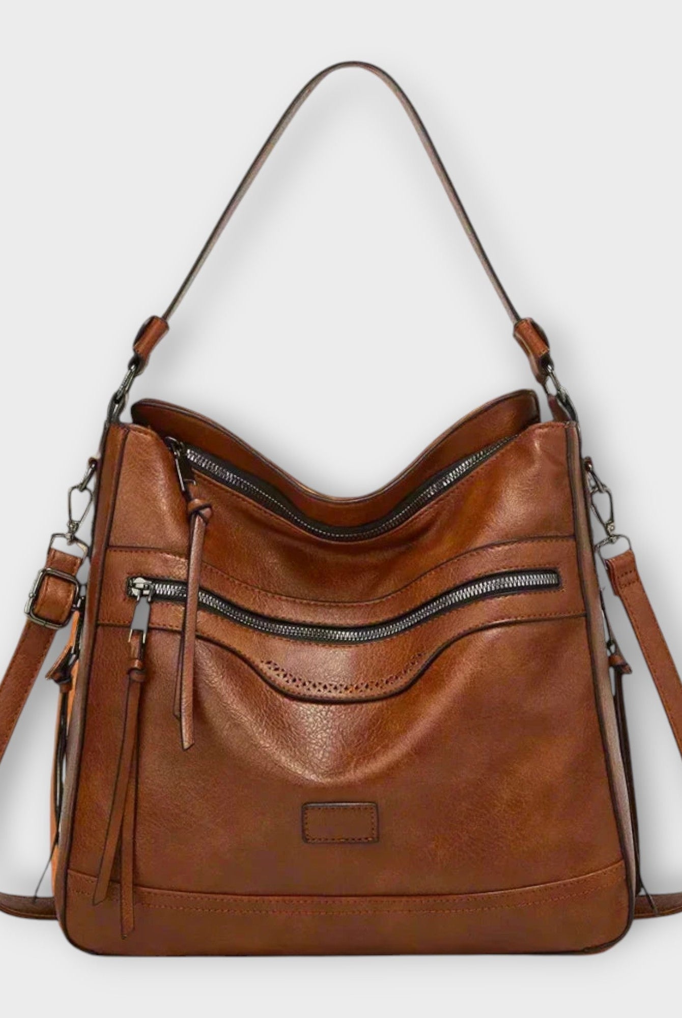 Isabella Lumina black slouchy shoulder bag with versatile straps, stylish handbag with soft leather finish and adjustable strap.