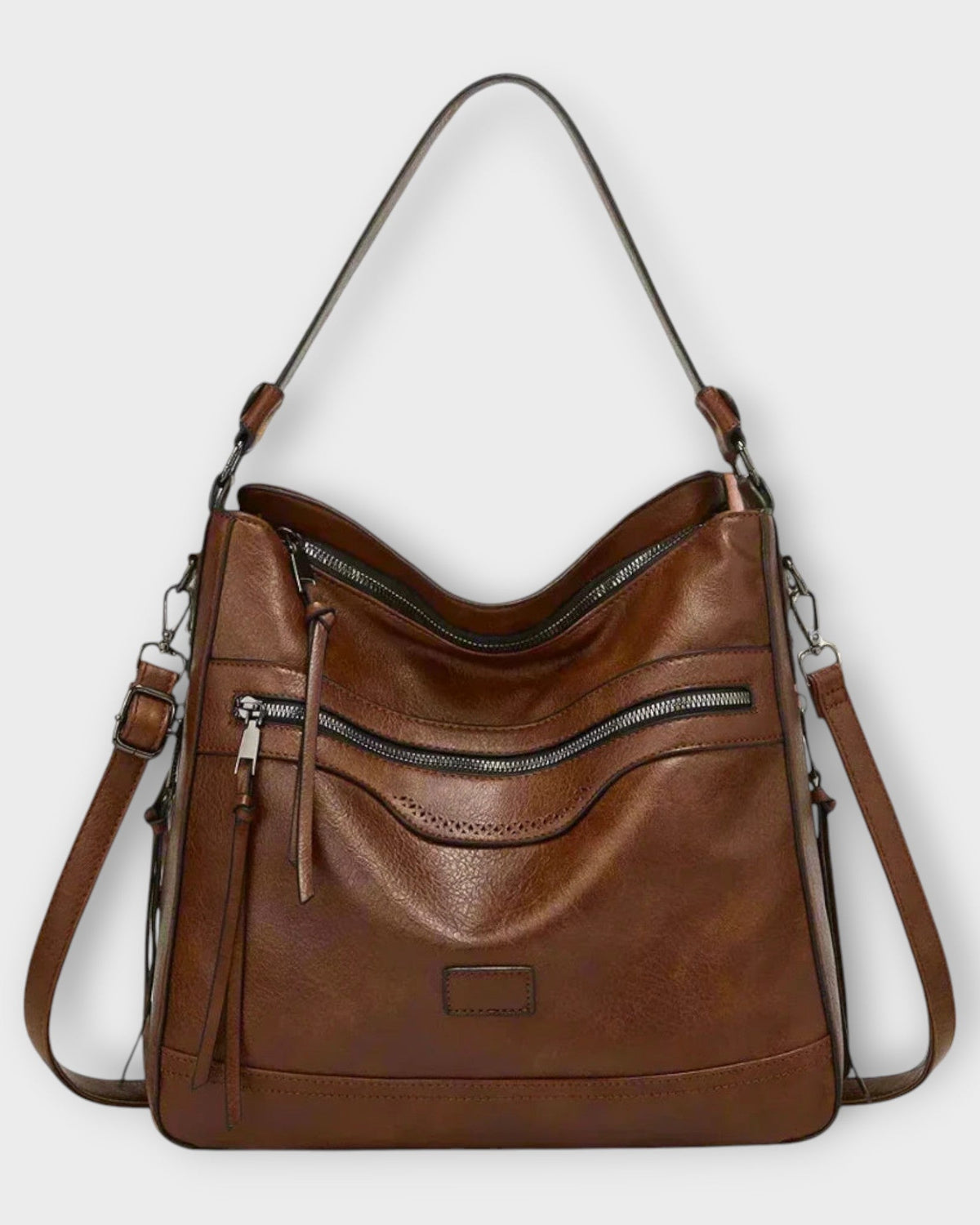 Black Lumina Wear Isabella slouchy shoulder handbag with versatile straps, featuring a stylish and spacious design.