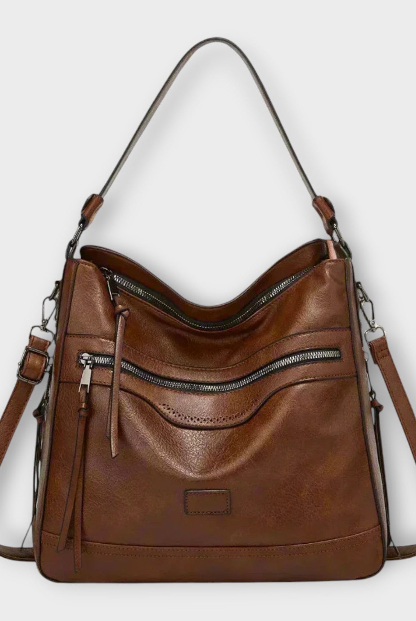 Isabella black slouchy shoulder bag with versatile straps from Lumina Wear, featuring a casual, spacious design for everyday use.
