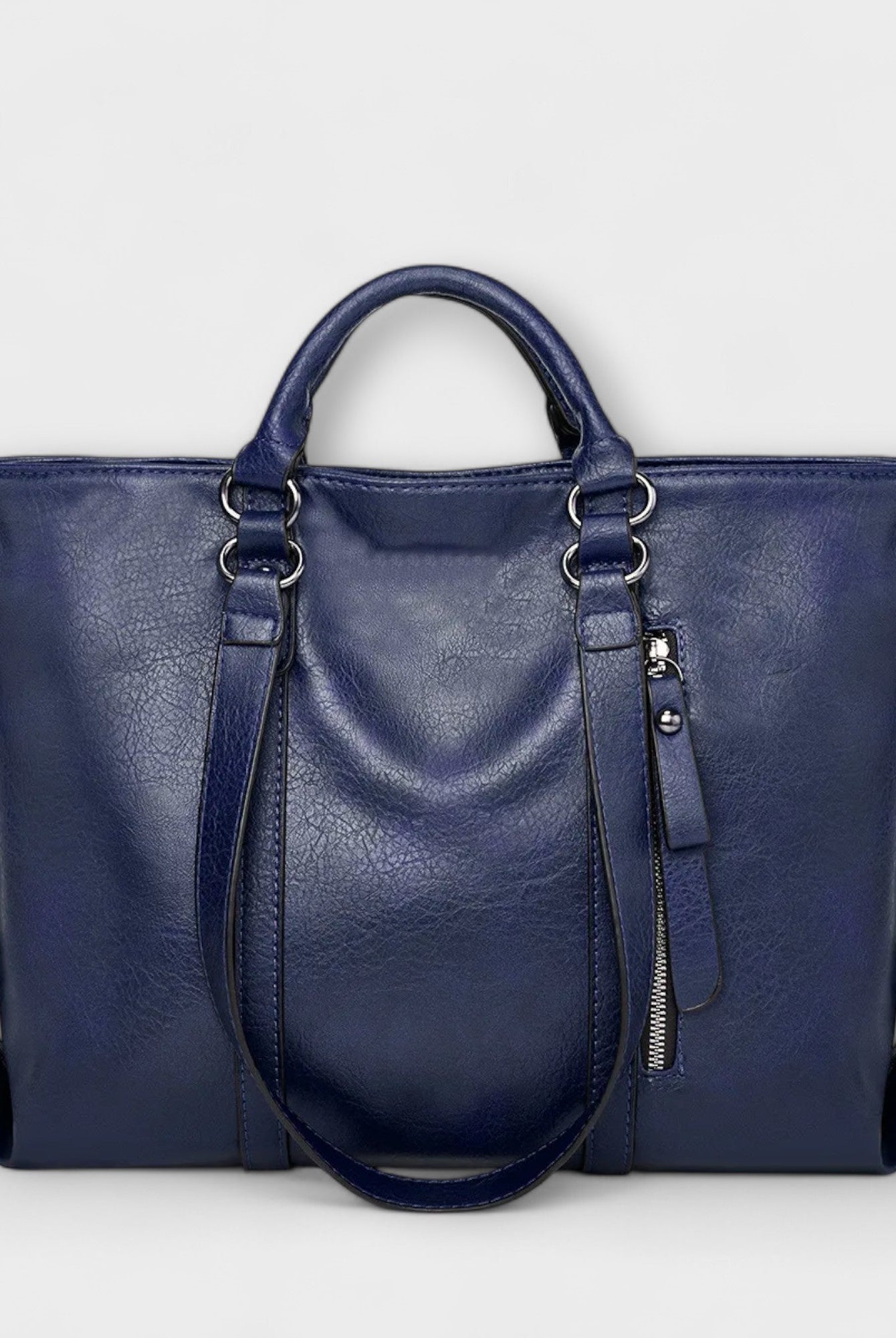 Brown Lumina Wear Isabella tote bag with spacious, versatile design, showing sturdy handles and roomy interior.