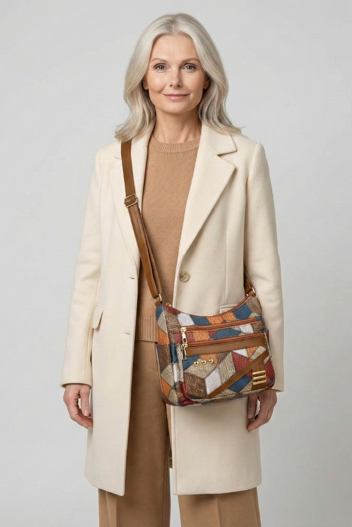 Isabella textured patchwork shoulder bag by Lumina Wear with faux-leather accents, featuring a stylish and versatile handbag design.