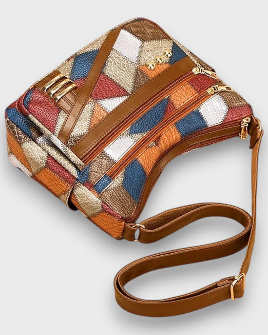 Isabella textured patchwork shoulder handbag by Lumina Wear with faux-leather accents, featuring dual top handles and stylish design.