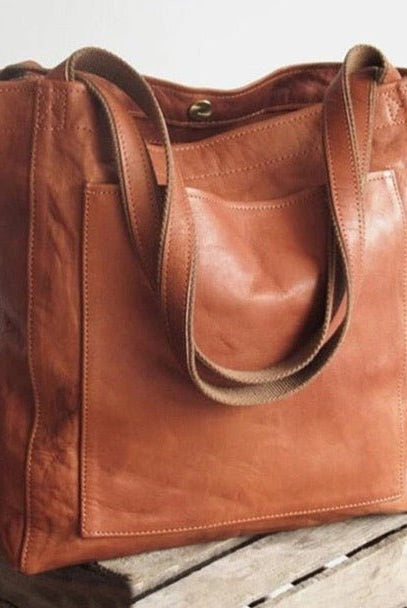 Lumina Wear Isabella brown leather shoulder bag with spacious interior and elegant design, perfect for stylish everyday use.