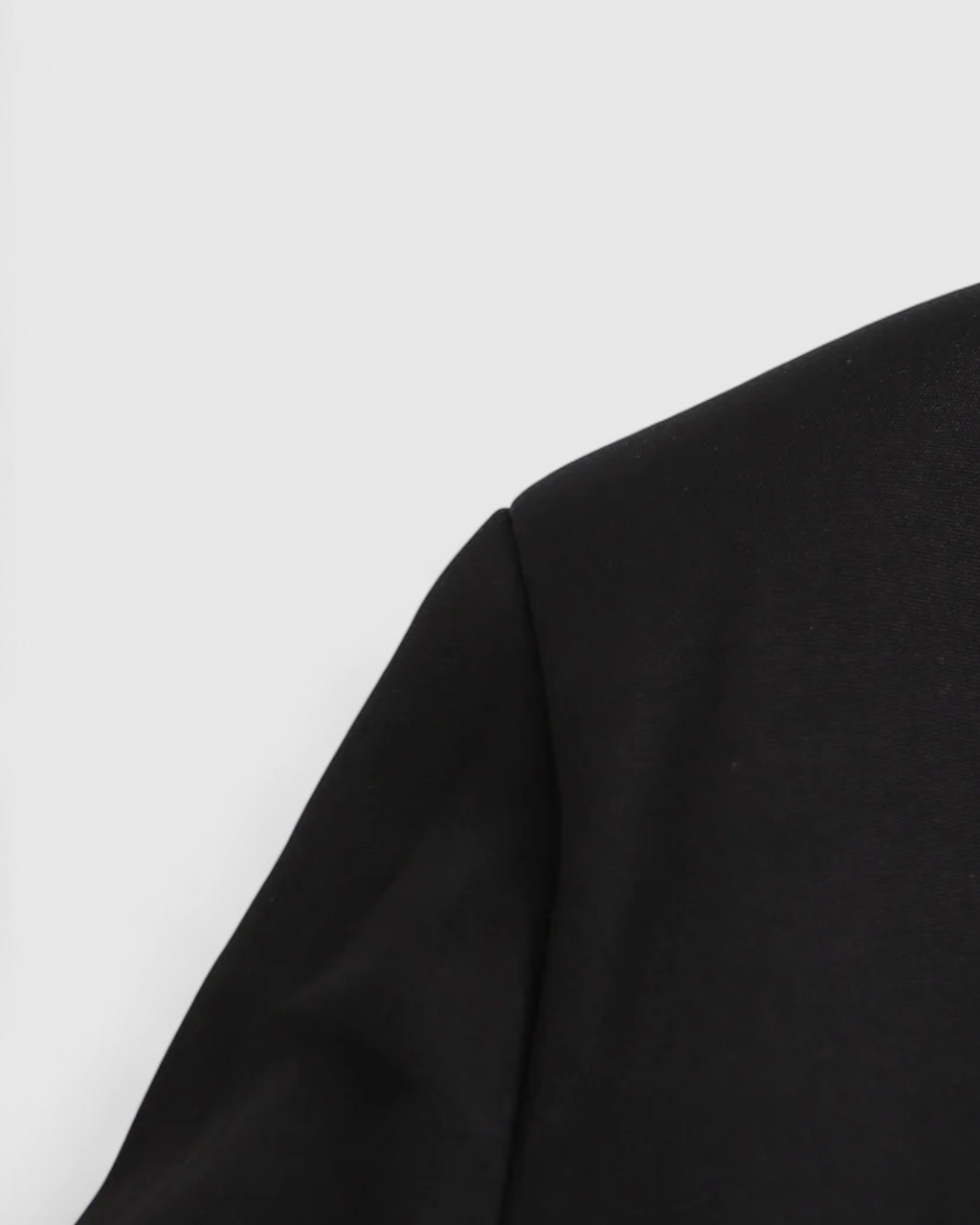 Black Isabella Lumina Wear cropped jacket with tailored fit, stylish womens jacket featuring a modern, trendy design.