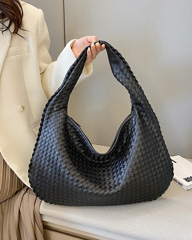 Beige Isabella Lumina woven eco-leather shoulder handbag with unique design and shoulder strap, stylish and eco-friendly fashion accessory.