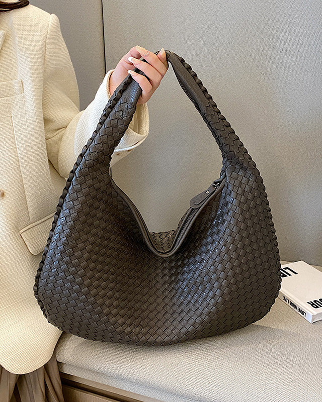 Beige Isabella Lumina woven eco-leather shoulder handbag with unique design and hand-stitched details, stylish and eco-friendly.