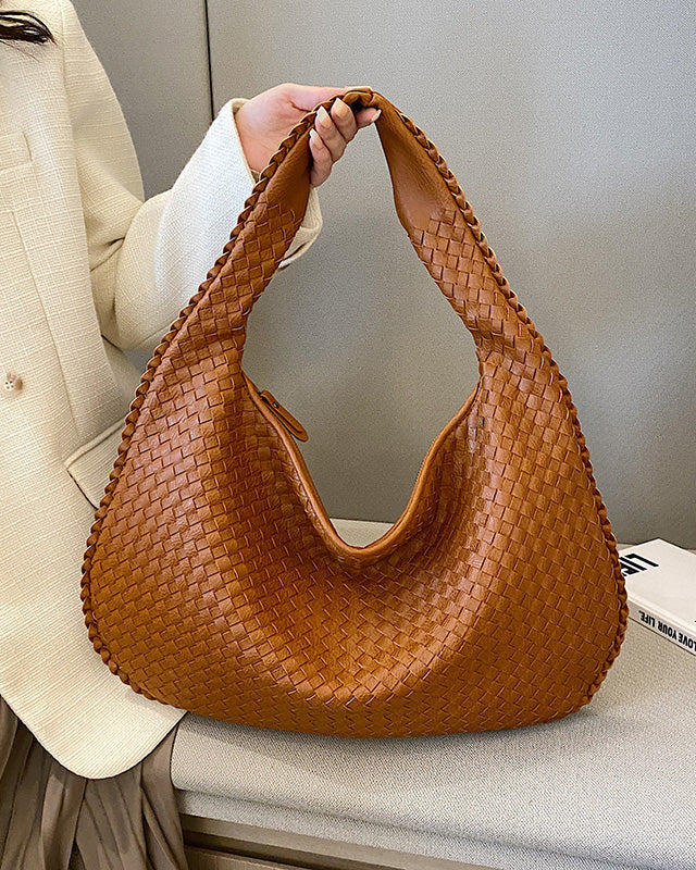 Beige Isabella woven eco-leather shoulder handbag by Lumina Wear, featuring a unique handcrafted design and spacious interior.