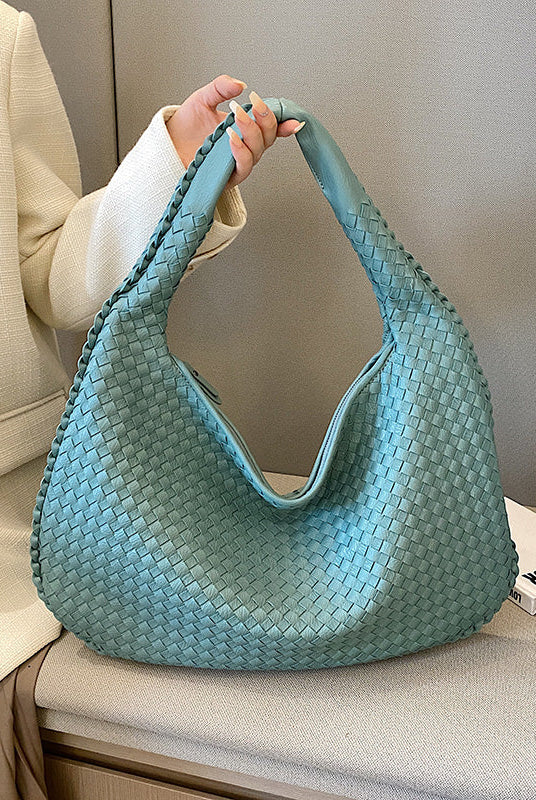 Beige Isabella woven eco-leather shoulder bag by Lumina Wear, showcasing a unique textured design and stylish hand-held silhouette.