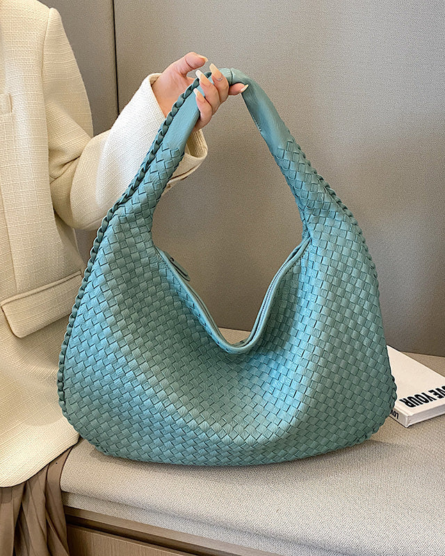 Beige Isabella Lumina woven eco-leather shoulder handbag with unique design, featuring a stylish and eco-friendly look.
