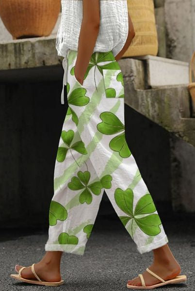 Isabella Lumina Wear vibrant cropped trousers with a flattering fit in rose color, styled for a modern, chic look.