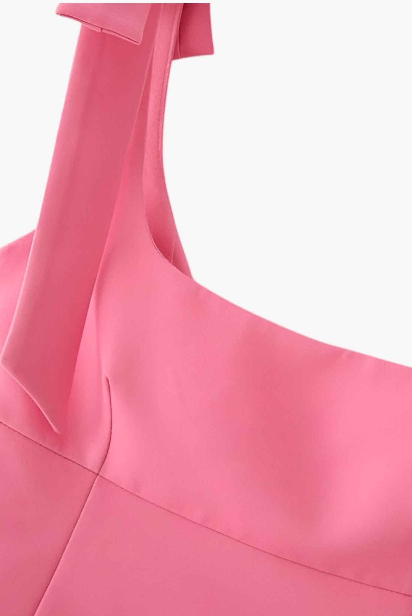 Vibrant pink Lumina Wear Isabella cami top with playful bow detail, sleeveless tank, stylish and feminine for casual wear.
