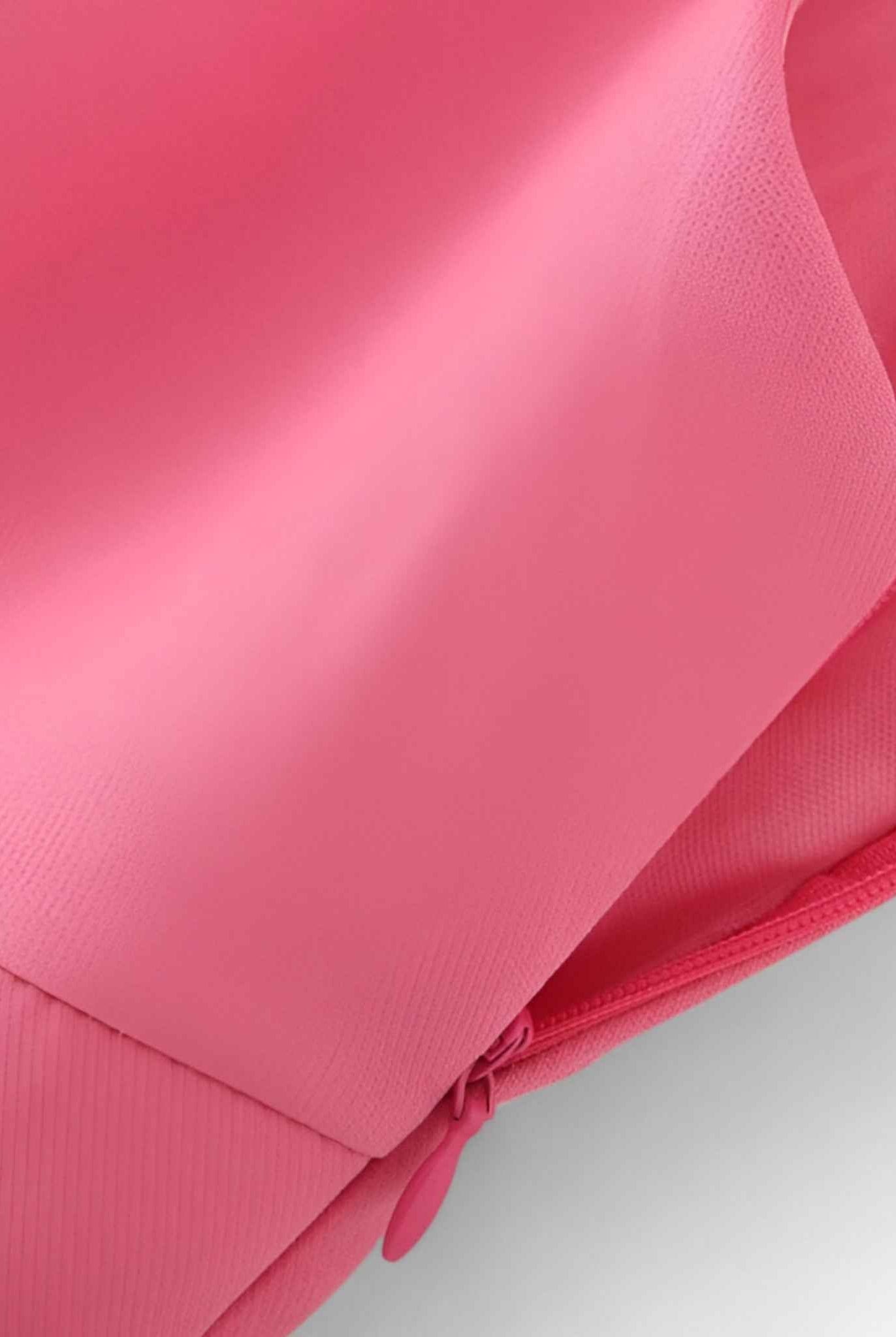 Vibrant pink cami top with playful bow detail from Lumina Wear, featuring a sleeveless design and lightweight fabric.
