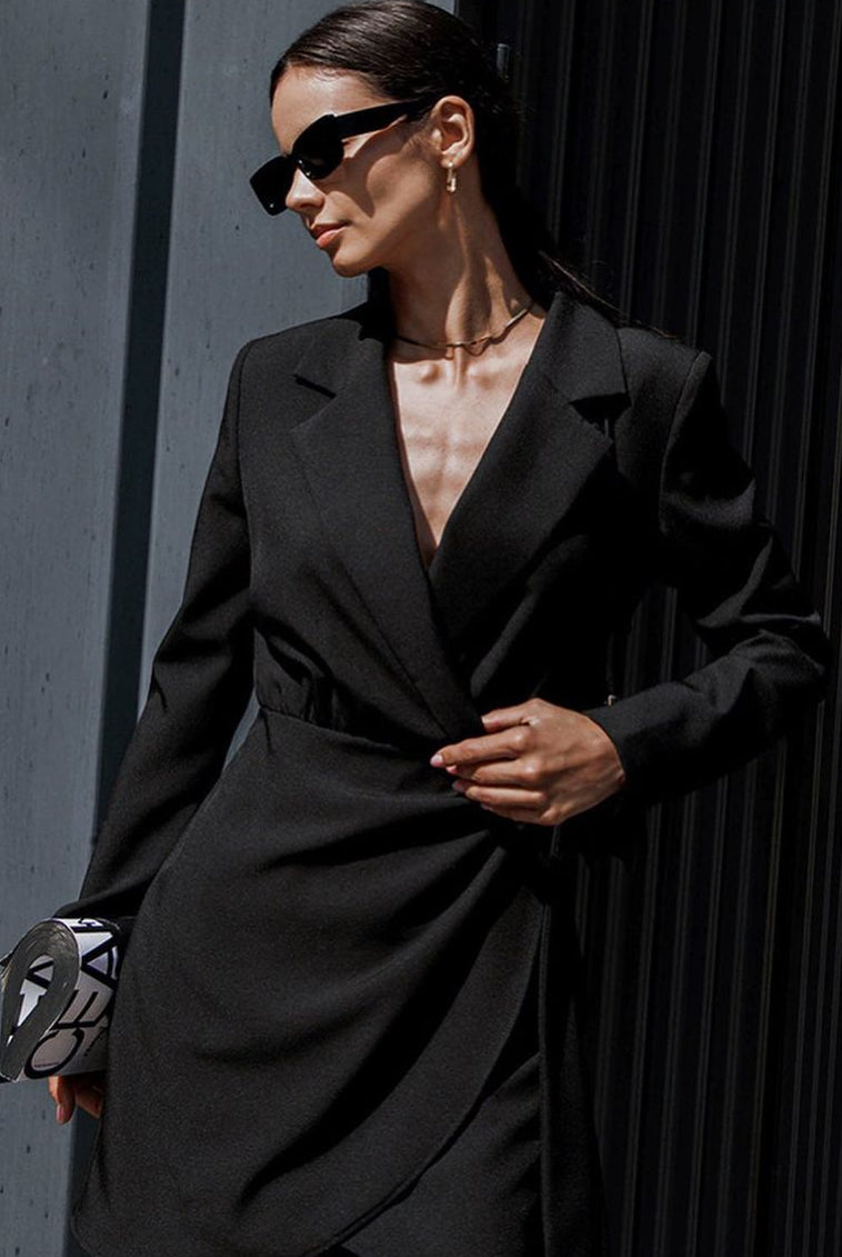 Isabelle classic black trench dress by Lumina Vancouver, stylish mini dress with trench-inspired design, displayed on a model.