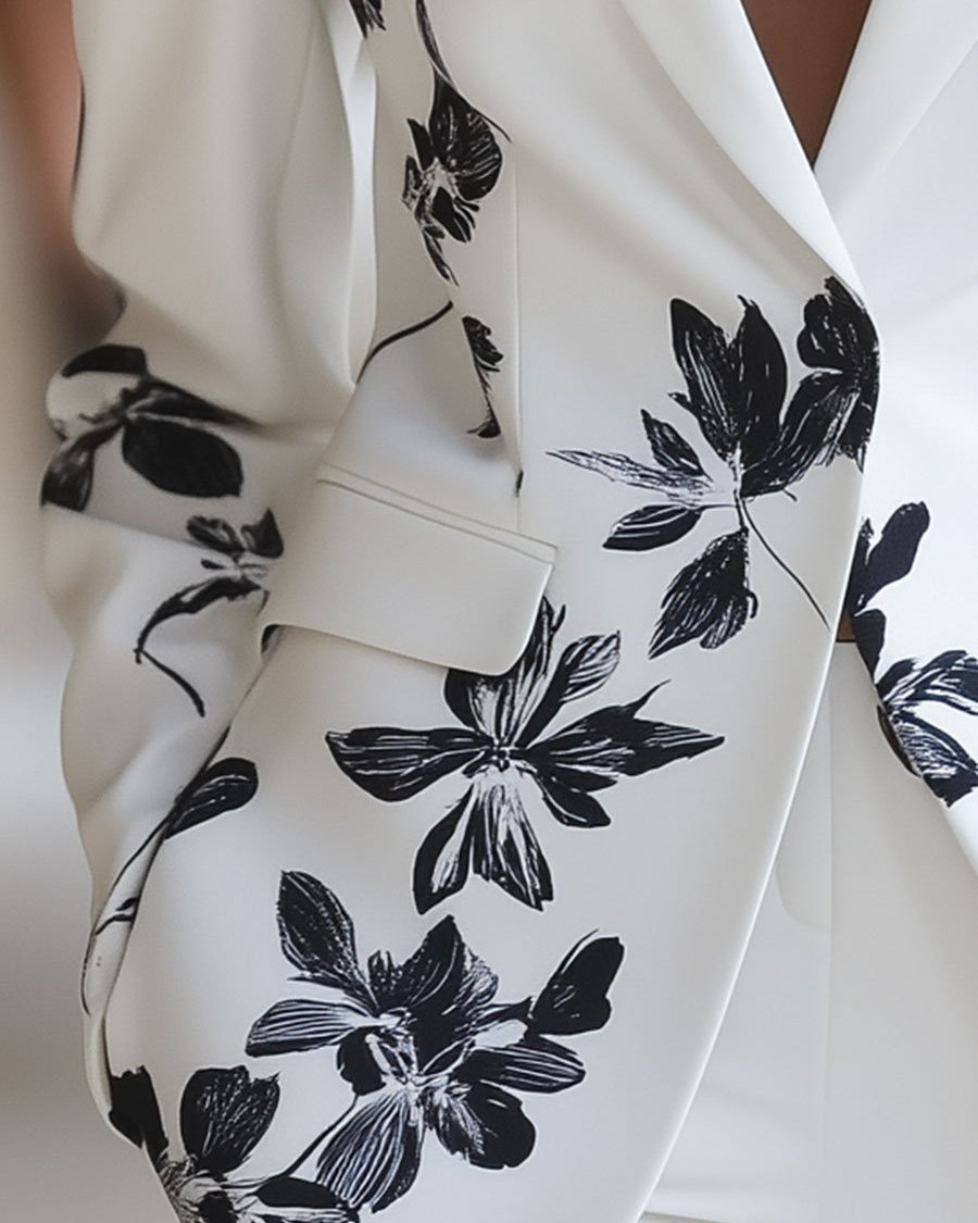 White floral printed blazer by Lumina Wear, featuring a tailored blazer style with vibrant floral patterns, perfect for stylish outfits.