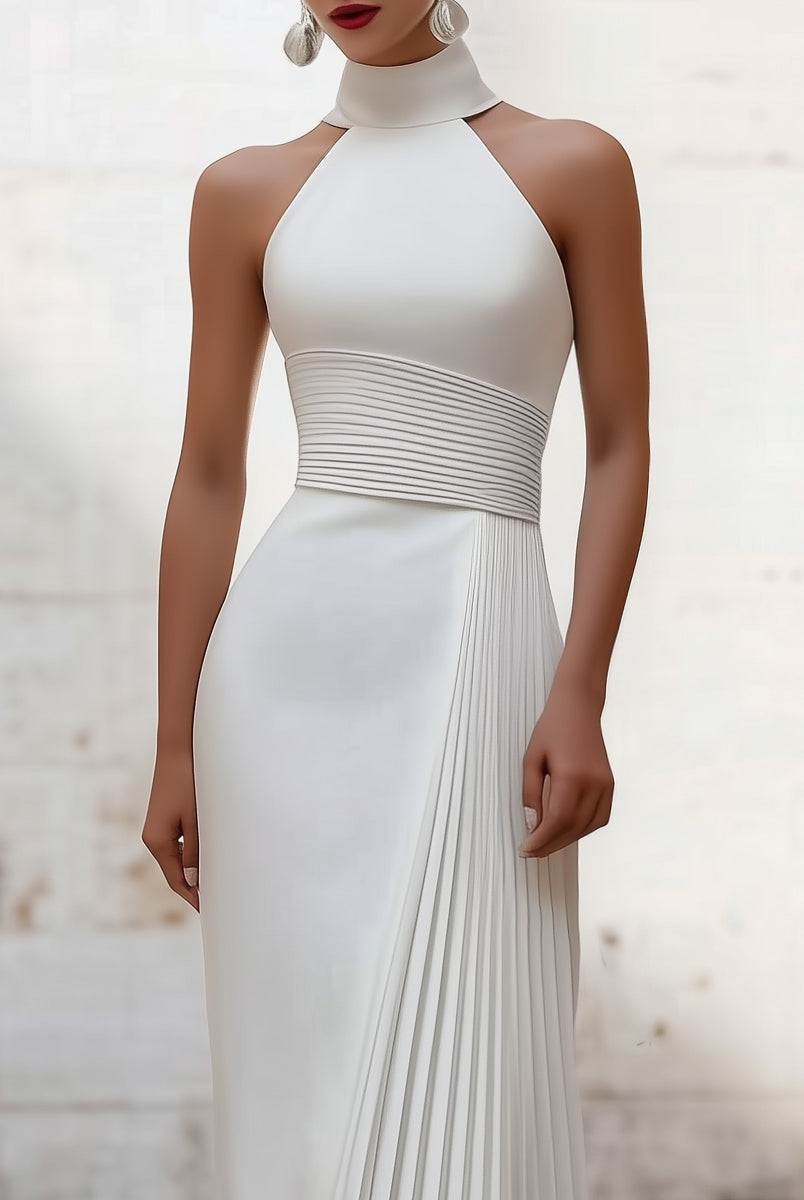 White Isabelle pleated halter-neck gown by Lumina Wear, elegant dress with flowing fabric and stylish design.
