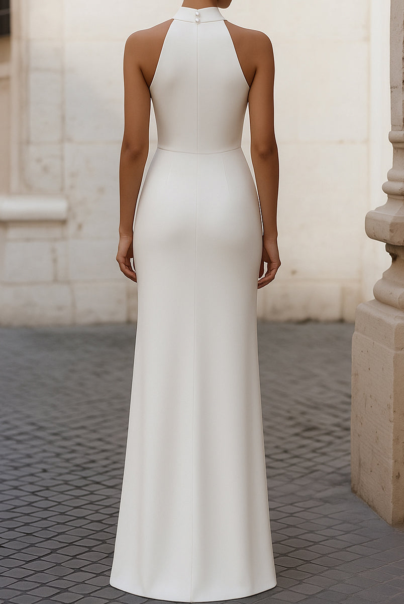 White Isabelle pleated halter-neck gown by Lumina Wear, showcasing elegant design and flowing fabric.