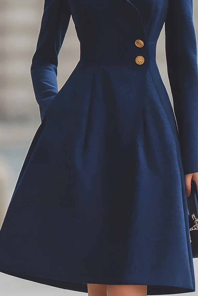 Navy blue Ottavia tailored fit flared peak lapel coat dress by Lumina Vancouver, styled as a midi dress on a model.