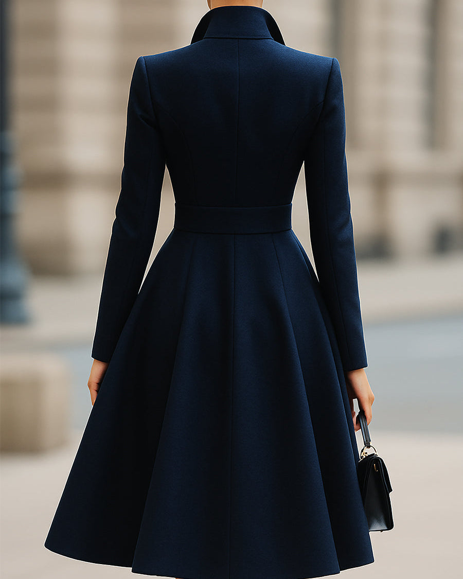 Navy blue Ottavia tailored fit flared midi coat dress by Lumina Wear, featuring peak lapel, structured silhouette, and elegant design.