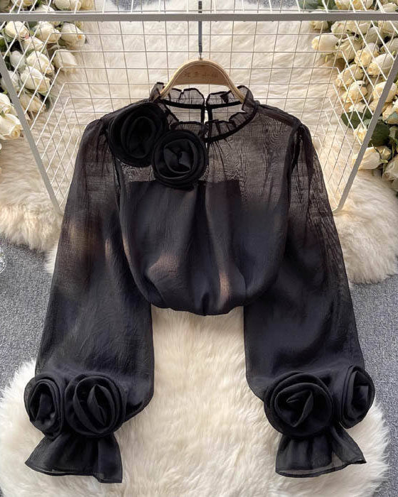 Lumina Wear Isabelle white blouse with 3D rose embellishments, featuring a stylish design and lightweight fabric.
