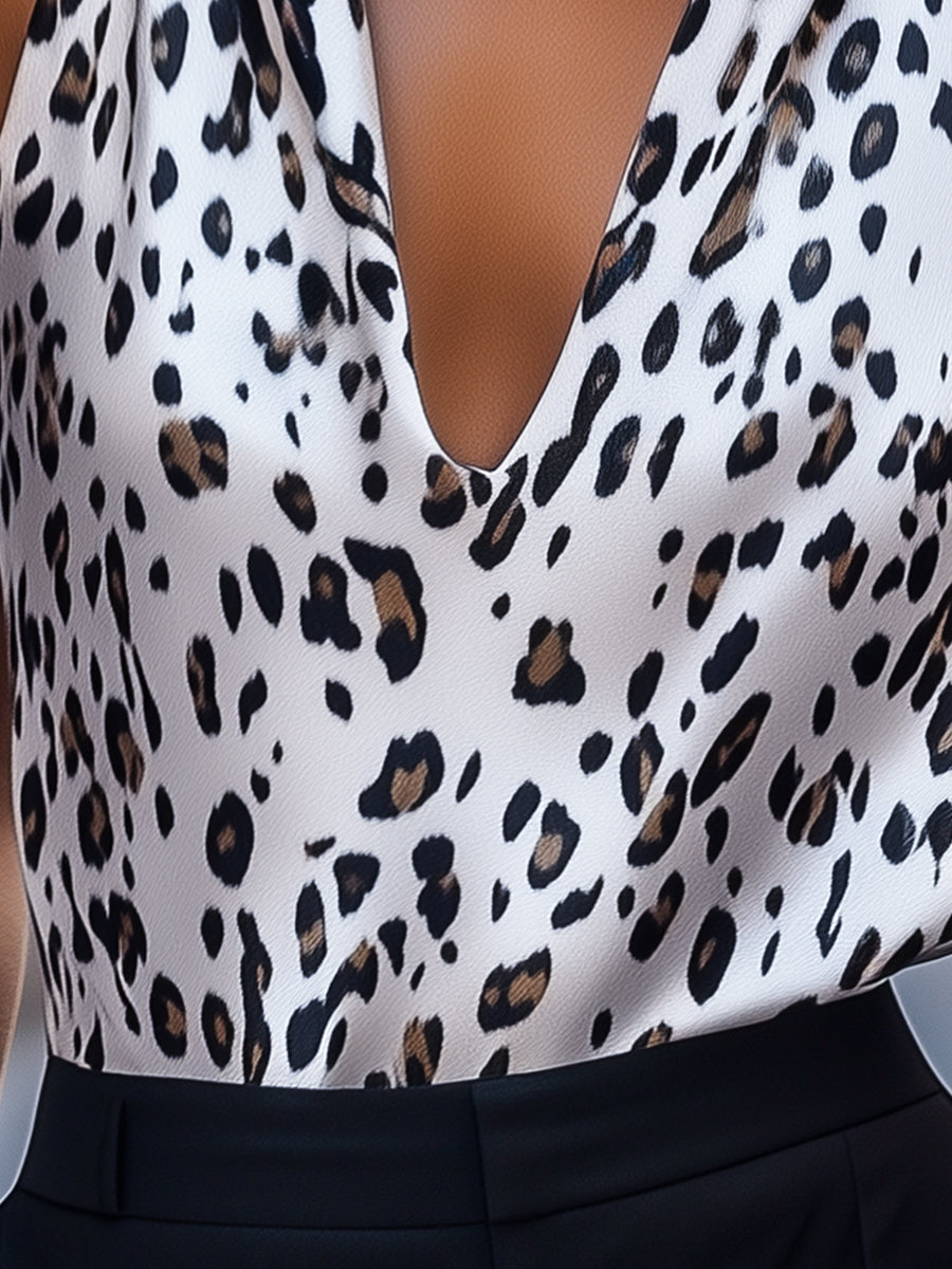 White leopard print halter top blouse by Lumina Vancouver, featuring a stylish design and comfortable fit.