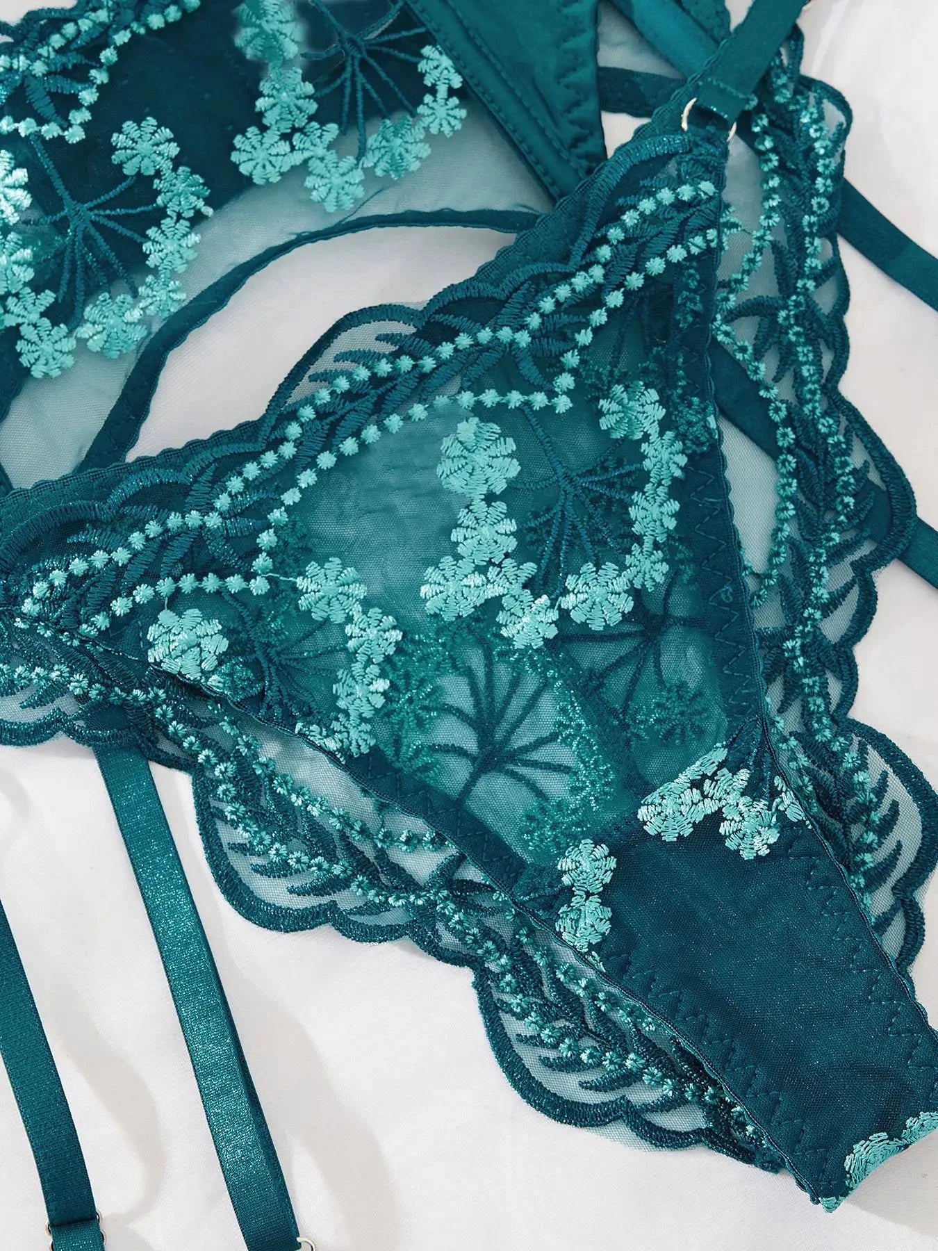 Lumina Vancouver Isla's Lingerie Set featuring delicate lace bra and matching panties in soft pastel colors.