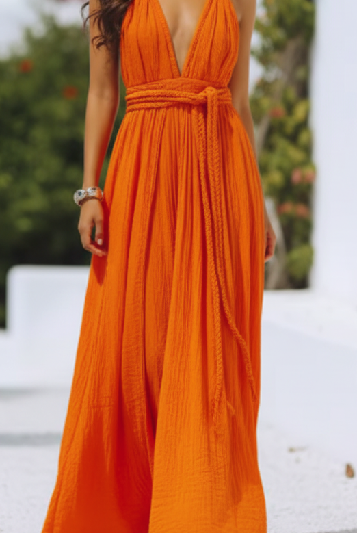 Orange Isla V-neck halter pleat maxi dress by Lumina Vancouver, featuring a flowing silhouette and elegant design.