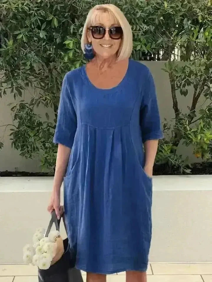 Blue Jana loose dress with pockets by Lumina Vancouver, featuring a relaxed fit and casual style.