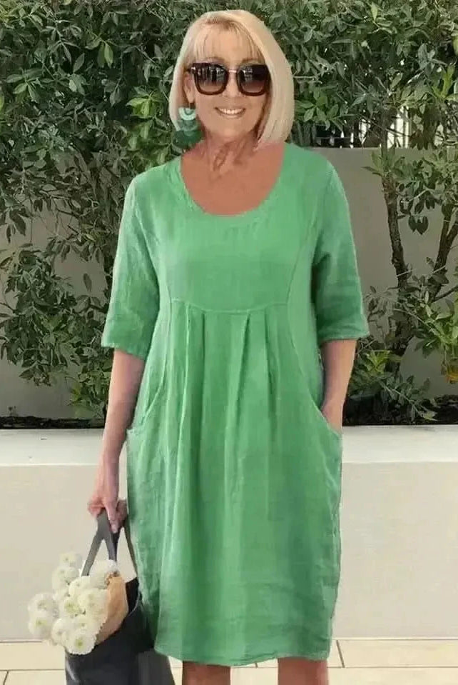 Blue loose dress with pockets from Lumina Wear's Jana collection, featuring a relaxed fit and casual style.