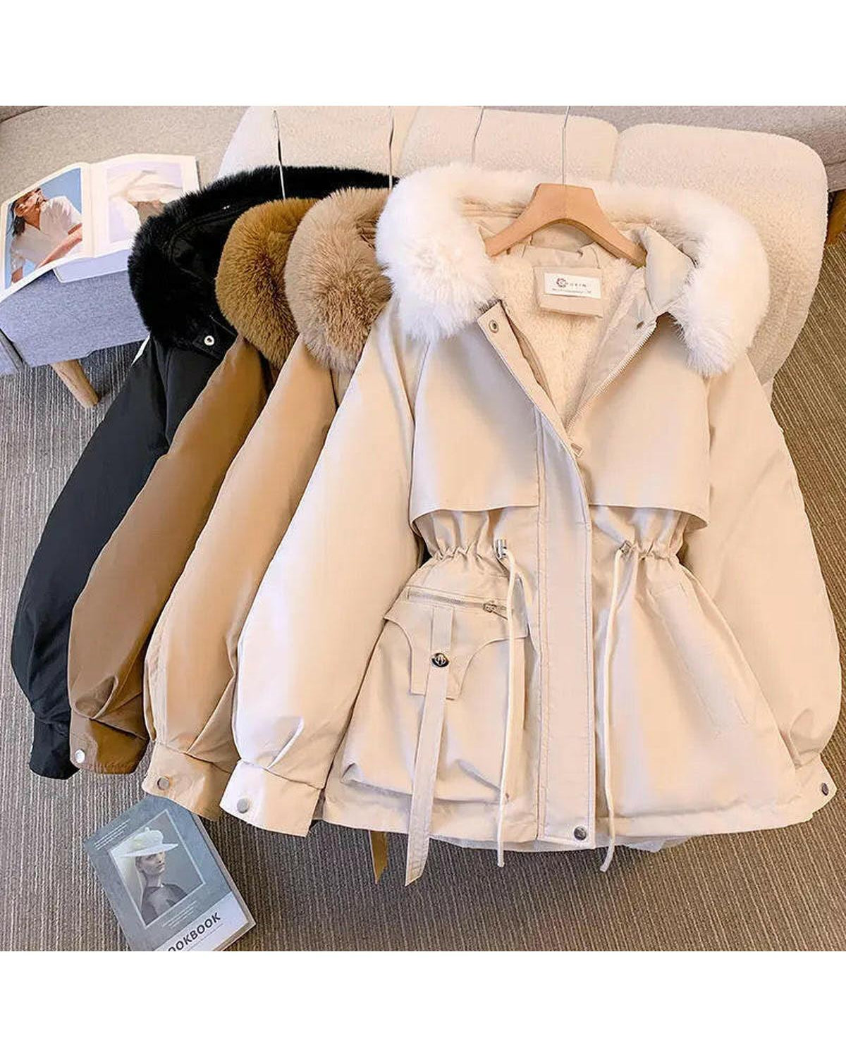 Lumina Wear Jarrah down jacket in creme, featuring a comfortable, insulated design for cold weather.