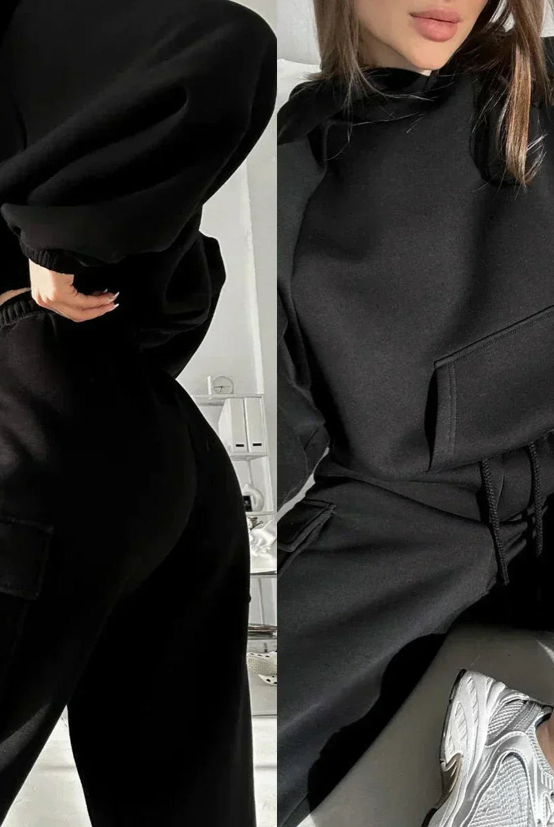 Black Jasmine relaxed fit cargo hoodie and sweatpants set by Lumina Wear, featuring cargo pockets and comfortable tracksuit style.