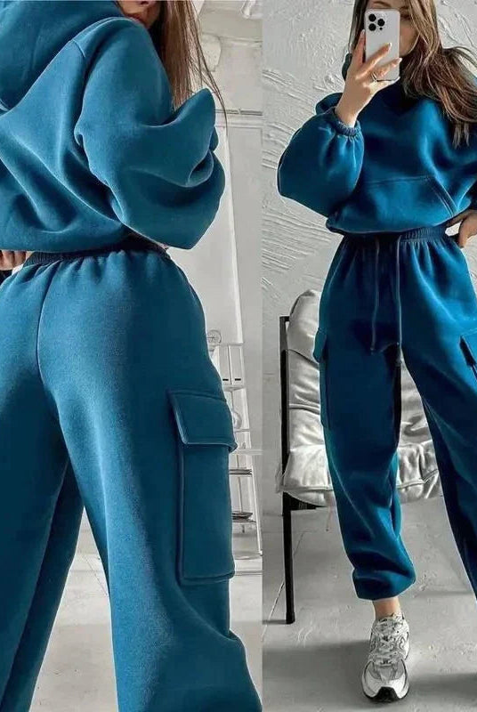Black Jasmine Lumina Wear relaxed fit cargo pocket hoodie and sweatpants set, showing the comfortable matching tracksuit.