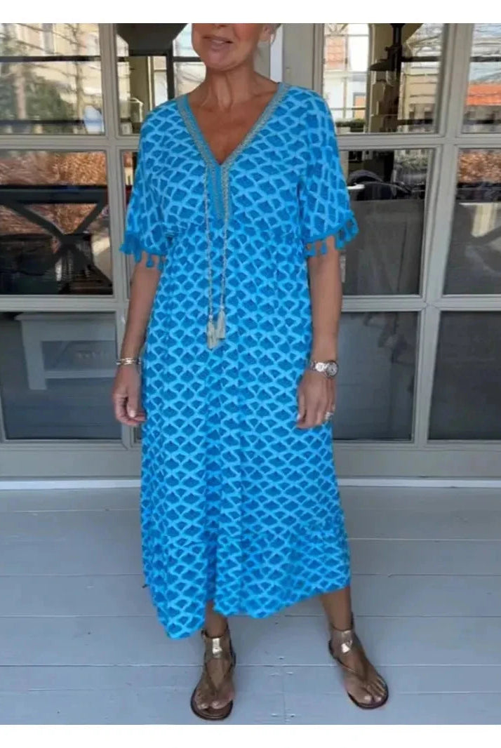 Blue Lumina Wear Jelly Embellished V-Neck Dress with decorative details, short length, perfect for stylish occasions.