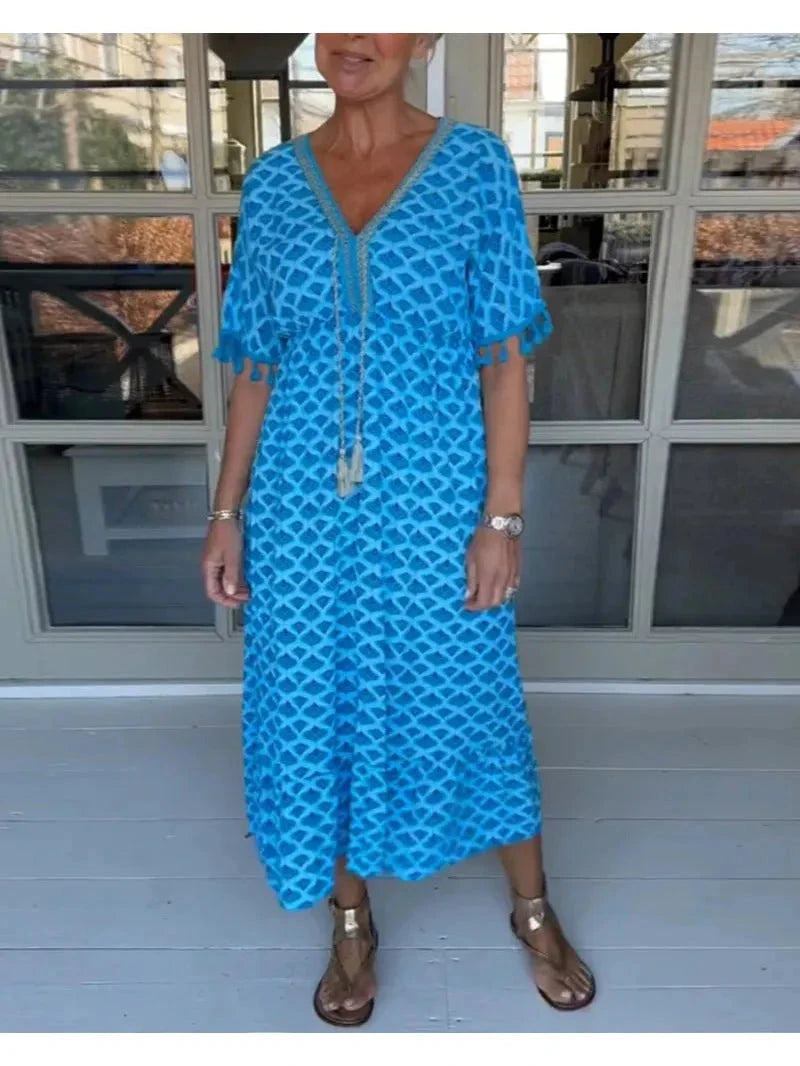 Blue Jelly embellished V-neck dress by Lumina Vancouver, featuring a stylish design perfect for special occasions.