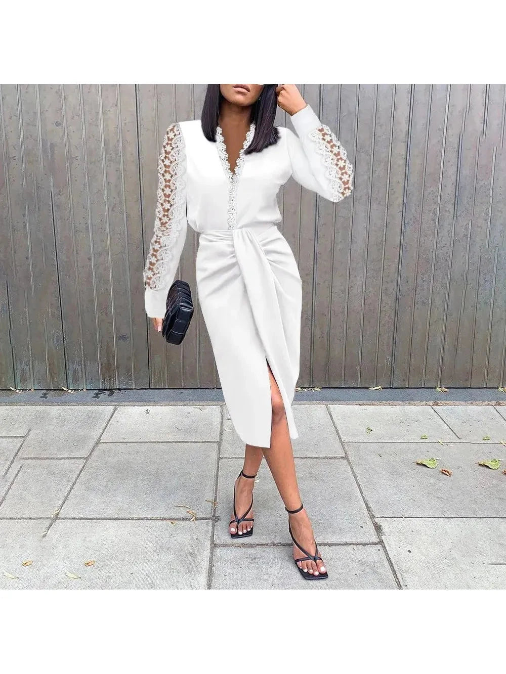 Black Jenna™ long sleeve wrap dress by Lumina Vancouver, featuring a stylish design and elegant fit.