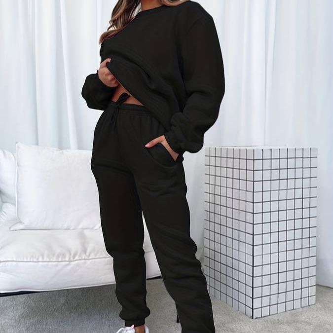 Black Jenna relaxed minimalist sweat set with jogger pants from Lumina Wear, casual and comfortable loungewear for women.