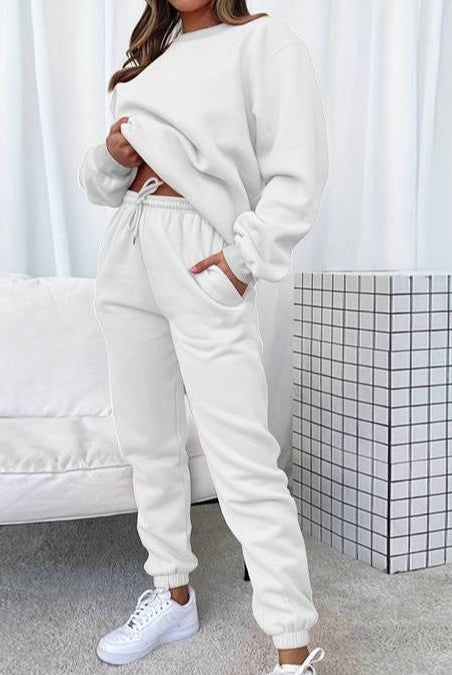 Black Jenna minimalist sweat set with jogger pants from Lumina Wear, featuring a relaxed fit and comfortable fabric.