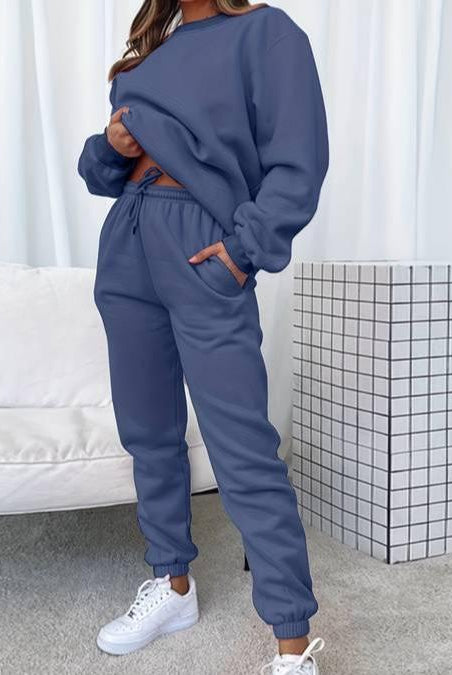 Black Jenna relaxed minimalist sweat set with jogger pants from Lumina Wear, casual and comfortable loungewear outfit.