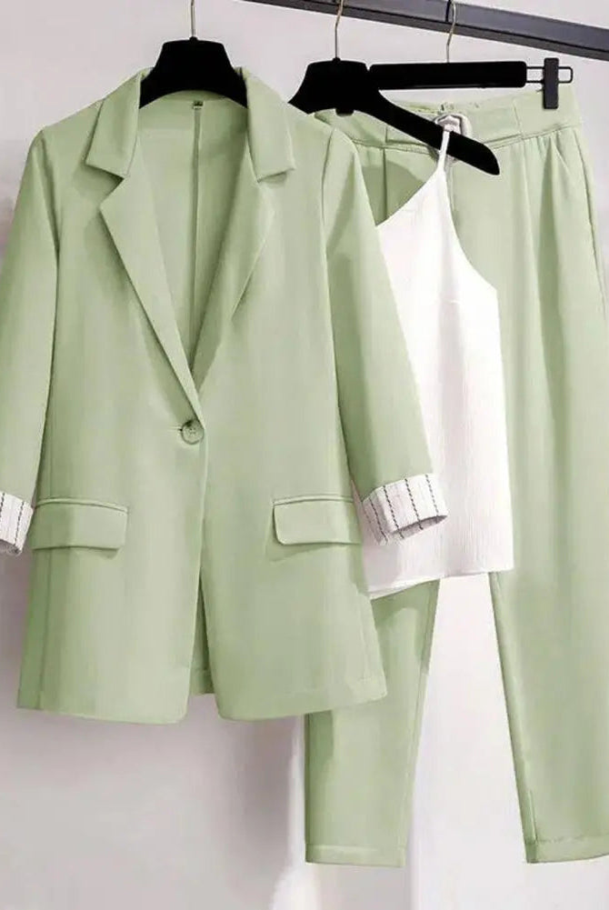 Black women's 2-piece matching outfit with a tailored blazer, sleek pants, and versatile top by Lumina Wear.