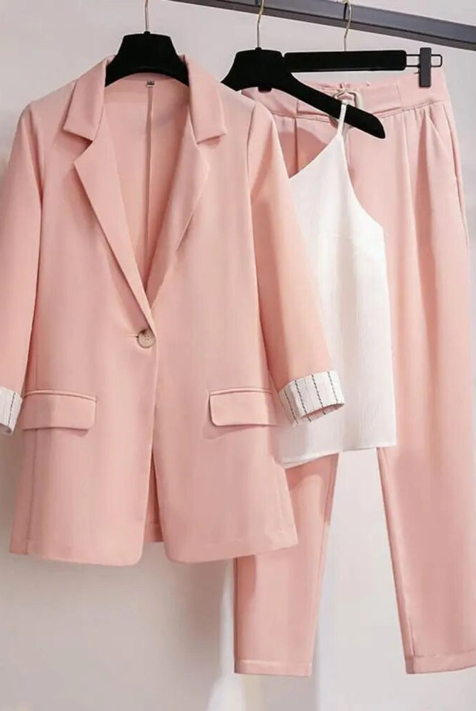 Black women's 2-piece set by Lumina Wear, featuring a tailored blazer, sleek pants, and versatile top, stylish and modern.