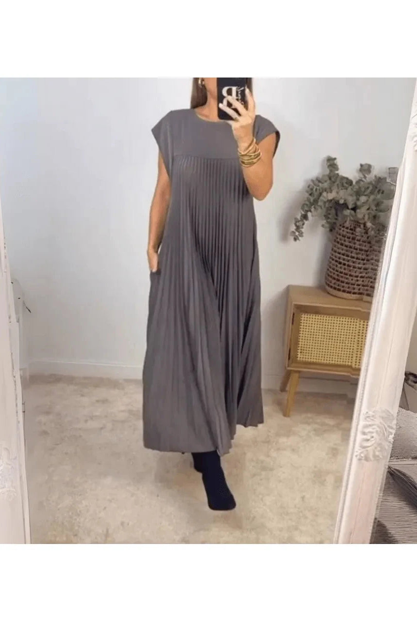 Beige elegant Lumina Wear Honorine dress with a fitted silhouette, perfect for formal occasions.