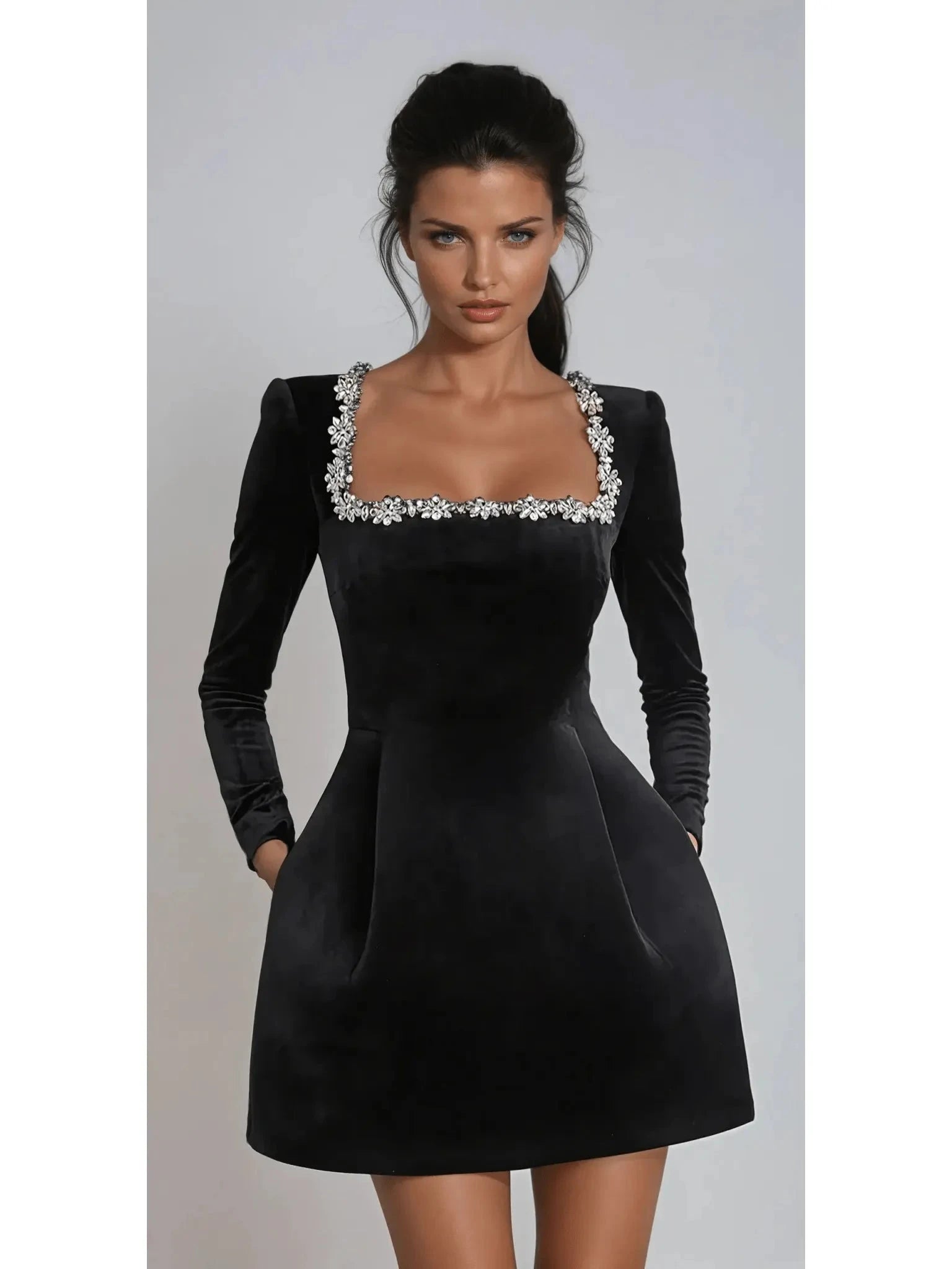 Black Garance Mini Dress from Lumina Vancouver's Isabeau Collection, perfect as a wedding guest dress, shown on a size 8-10 model.